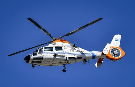 Argentina’s World Cup heroes airlifted in helicopters as Buenos Aires streets choked by fans