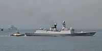 The People’s Liberation Army Navy (PLAN) warship, the Type 054A Frigate Chinese Navy Ship (CNS) CNS Xuchang (FFG536), arriving in Simon's Town bay. She is being escorted by Tug Imbuvu.. <br>(Photo:Charles Booysen #DeepSouthReport)