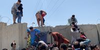 epaselect epa09416174 People struggle to cross the boundary wall of Hamid Karzai International Airport to flee the country after rumors that foreign countries are evacuating people even without visas, after Taliban took control of Kabul, Afghanistan, 16 August 2021. Taliban co-founder Abdul Ghani Baradar Monday declared victory and end to the decades-long war in Afghanistan, a day after the insurgents entered Kabul to take control of the country. Baradar, who heads the Taliban political office in Qatar, released a short video message after President Ashraf Ghani fled and conceded that the insurgents had won the 20-year war.  EPA-EFE/STRINGER
