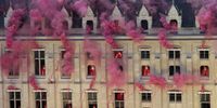 Smoke billows near windows as performers participate during the Opening Ceremony of the Olympic Games Paris 2024 on July 26, 2024 in Paris, France. (Photo by Bernat Armangue - Pool/Getty Images)
