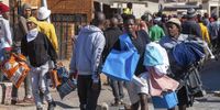 Looting in Ndofaya, Soweto on 12 July during sporadic protests which began in KwaZulu-Natal last week with Zuma's supporters calling for his immediate release. (Photo by Gallo Images/Papi Morake)