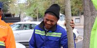 Mekail Davidson, a worker in the City of Cape Town's Parks and Recreation directorate, was part of the tree replanting on Monday, 25 May 2025, in the Newlands area. Soon, a row of Water Oaks will line the edge of a busy parking lot in Newlands, where there were once thriving Box Elder trees, offering the promise of future shade and beauty, while also playing a role in the city’s strategy to combat the effects of climate change and urban heat. (Photo: Kristin Engel)