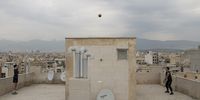 Behnia and Hossein. In March 2020, in reaction to the Covid-19 outbreak, the Iranian government announced the immediate closure of all athletic venues, sports clubs and training centres across Iran. Following the implementation of this mandate, athletes in Iran took to training on the rooftops of their homes in order to maintain a degree of their physical and mental fitness and prowess. © Seyed Ali ( Farzam ) Saleh, Iran, Finalist, Professional, Sport, 2021 Sony World Photography Awards