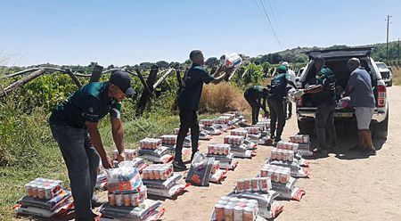 Huge helicopter food drop brings relief to residents cut off by rising waters