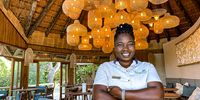 Waitress Nonhlanhla Gumede, one of the queens of the lodge dining room floor. (Photo: Angus Begg)