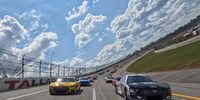 Aric Almirola, driver of the #10 Smithfield Ford, and Joey Logano, driver of the #22 Shell Pennzoil Ford, lead the field on a pace lap prior to the NASCAR Cup Series YellaWood 500 at Talladega Superspeedway on October 01, 2023 in Talladega, Alabama. (Photo by Sean Gardner/Getty Images)