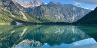 Mirror image at Plansee Austria. Image: Berno Niebuhr
