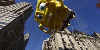 epa09602805 SpongeBob SquarePants &amp; Gary float down Central Park West during the Macy's 95th Annual Thanksgiving Day Parade in New York City, New York, USA, 25 November 2021. The annual parade, which began in 1924, features giant balloons of characters from popular culture floating above the streets of Manhattan.  EPA-EFE/JASON SZENES
