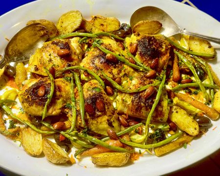 Leo’s chicken thighs with garlic, black olives, orange and almonds