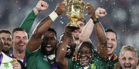 Cyril Ramaphosa, President of South Africa lifts with Webb Ellis Cup with Siya Kolisi after their side win the Rugby World Cup 2019 Final between England and South Africa at International Stadium Yokohama on November 2, 2019 in Yokohama, Kanagawa, Japan. (Photo: Craig Mercer/MB Media/Getty Images )