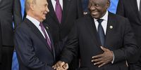 Russian President Vladimir Putin laughs with South African President Cyril Ramaphosa during a family photo ahead of the outreach/BRICS Plus format meeting of the BRICS summit in Kazan, Russia, 24 October 2024. The BRICS summit takes place from 22 to 24 October.  EPA-EFE/ALEXANDER NEMENOV / POOL