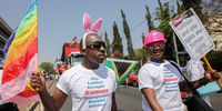 Marchers walk through the streets during the 21st year of the annual Gay Pride march in Johannesburg, South Africa, 02 October 2010. Although South Africa has a liberal view to LGBTQIA+ rights many African countries are very harsh towards  LGBTQIA+.  (Photo: EPA / KIM LUDBROOK)