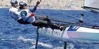 Tim Mourniac and Lou Berthomieu of France compete in the Mixed Multihull event of the Sailing competitions in the Paris 2024 Olympic Games, at the Marseille Marina in Marseille, France, 05 August 2024.  EPA-EFE/SEBASTIEN NOGIER