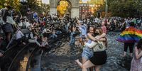 People stand in the fountain as they celebrate in Washington Square Park after it was announced that Democratic nominee Joe Biden would be the next U.S. President on November 7, 2020 in New York City. According to several news outlets presidential nominee Joe Biden has defeated incumbent U.S. President Donald Trump to become the 46th President of the United States. (Photo by Stephanie Keith/Getty Images)