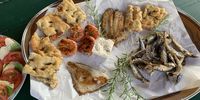 Our fish feast from the caravan, including mantecato. (Photo: Margot Patterson) 