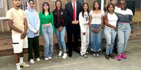 Lotus High School principal Stephen Price with nine of the school’s 10 top achievers. <br>Photo: Vincent Cruywagen