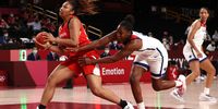 SAITAMA, JAPAN - AUGUST 08: Monica Okoye #99 of Team Japan drives to the basket against Chelsea Gray #8 of Team United States during the first half of the Women's Basketball final game on day sixteen of the 2020 Tokyo Olympic games at Saitama Super Arena on August 08, 2021 in Saitama, Japan. (Photo by Kevin C. Cox/Getty Images)