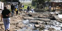 Union Road in Kliptown, Soweto. Community members have complained about litter and sewage that runs across the road. People also say the government has forgotten the area as the road has not been repaired. (Photo: Felix Dlangamandla)
