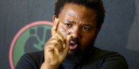 Black First Land First (BLF) leader Andile Mngxitama addresses the media regarding his alleged controversial remarks about the killing of white people on December 11, 2018 in Johannesburg, South Africa.(Photo by Gallo Images / Sowetan / Masi Losi)