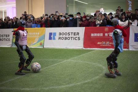 China's 'robot Olympics' sees humanoids from 16 nations compete in table tennis, football, track