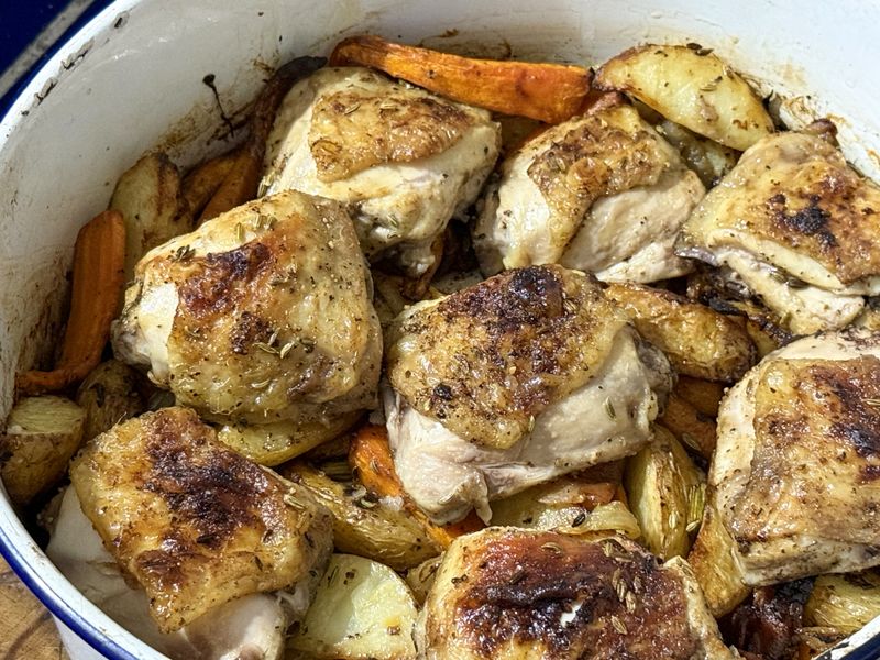 Baked chicken thighs and vegetables with flavours of anise