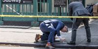 New York City police officers look at shell casings at a crime scene where two people were shot and injured outside of a deli in the Brooklyn borough of New York, New York, USA, 31 May 2023.  EPA-EFE/JUSTIN LANE