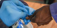 A voter's thumb is inked at a Johannesburg polling station. (Photo by Gallo Images/Sharon Seretlo)