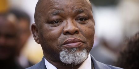 Gwede Mantashe carries a big contender for a national symbol in front of him