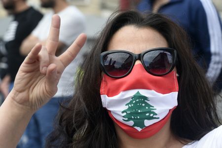 Libya's Tripoli government imposes COVID-19 curfew after protests escalate