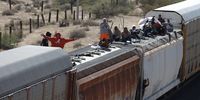 Migrants travel atop the freight train called 'La Bestia' in Ciudad Juarez, Chihuahua State, Mexico, 29 September 2023 (issued 01 October 2023). Thousands of migrants are still boarding the trains in Mexico on their way to the United States, despite efforts by authorities and the train company Ferromex to deter them.  EPA-EFE/LUIS TORRES
