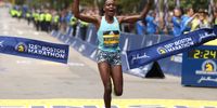 BOSTON, MASSACHUSETTS - OCTOBER 11: Diana Kipyogei of Kenya crosses the finish line to win the 125th Boston Marathon on October 11, 2021 in Boston, Massachusetts. (Photo by Maddie Meyer/Getty Images)