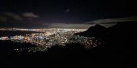 Watching Cape Town wake from Lion's Head.  