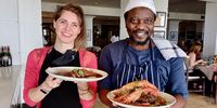 Claire Potgieter and TK Mpanza club up as Grimaldi’s opens the door to diners. (Photo: Wanda Hennig)