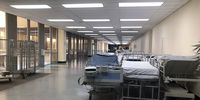 Beds stacked side-by-side line a deserted passage at Charlotte Maxeke Hospital in Johannesburg. <br>(Photo: Mark Heywood)