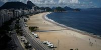 RIO DE JANEIRO, BRAZIL - MARCH 22: General view of an empty Copacabana Beach during a lockdown aimed at stopping the spread of the coronavirus (COVID-19) pandemic on March 22, 2020 in Rio de Janeiro, Brazil. Sundays would normally be a busy day, but is relatively quiet with additional precautions being taken amid the coronavirus (COVID-19). Rio de Janeiro´s state government imposed restrictions to public transport. Bus lines and trains are closed, ferries and subway are running at a limited capacity. According to the Ministry of Health, as of Sunday, March 22, Brazil had 1.546 confirmed cases of the coronavirus (COVID-19) and at least 25 recorded  deaths. (Photo by Wagner Meier/Getty Images)