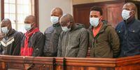 The six men appear at the Johannesburg Magistrate’s Court for bail application on 9 December, 2021 in Johannesburg, South Africa. (Photo: Gallo Images/Papi Morake)
