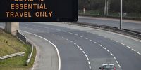 GLASGOW, SCOTLAND - MARCH 24: A motorway sign on the M8 motorway advising on essential travel only on March 24, 2020 in Glasgow, Scotland. First Minister of Scotland Nicola Sturgeon along with British Prime Minister, Boris Johnson, announced strict lockdown measures last night urging people to stay at home and only leave the house for basic food shopping, exercise once a day and essential travel to and from work. The Coronavirus (COVID-19) pandemic has spread to at least 182 countries, claiming over 10,000 lives and infecting hundreds of thousands more.  (Photo by Jeff J Mitchell/Getty Images)