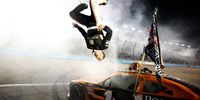 AVONDALE, ARIZONA - NOVEMBER 06: Daniel Hemric, driver of the #18 Poppy Bank Toyota, celebrates with a backflip after winning  the NASCAR Xfinity Series Championship at Phoenix Raceway on November 06, 2021 in Avondale, Arizona. (Photo by Jared C. Tilton/Getty Images)