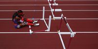TOKYO, JAPAN - AUGUST 04: Yorgelis Rodriguez of Team Cuba reacts after falling in the Women's Heptathlon 100m Hurdles heats on day twelve of the Tokyo 2020 Olympic Games at Olympic Stadium on August 04, 2021 in Tokyo, Japan. (Photo by Patrick Smith/Getty Images)