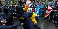 Police officers detain a demonstrator during a protest against a bill on "foreign agents" in Tbilisi, Georgia, May 13, 2024. REUTERS/Irakli Gedenidze     TPX IMAGES OF THE DAY