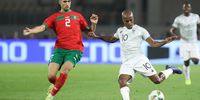 Percy Muzi Tau of South Africa challenges Achraf Hakimi of Morocco during 2023 Africa Cup of Nations match between Morocco and South Africa at Laurent Pokou Stadium in San Pedro, Cote dIvoire on 30 January 2024  ©Weam Mostafa/BackpagePix