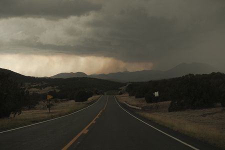 Flash floods in New Mexico resort town kill three, trap dozens in homes and vehicles