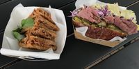 My happy day of eating: a toasted rye pork shank ragu sandwich and my pastrami pretzel roll. (Photo: Marie-Lais Emond)
