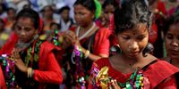 Members of Bangiya Christiya Pariseba, a forum of Christians of all denominations in West Bengal, perform folk dance as they gather during a mass rally for peace near the Gandhi statue in Kolkata, eastern India, 03 April 2024. The prayer rally was organized by Bangiya Christiya Pariseba to 'pray for the change of hearts of those who, in the name of religion, preach hatred, organize attacks, and make simple people into fanatical killers'.  EPA-EFE/PIYAL ADHIKARY