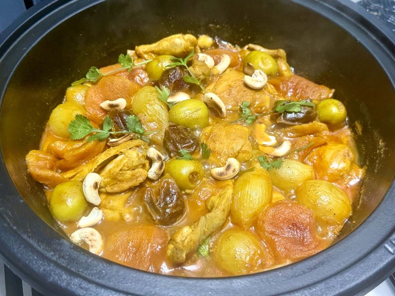 Chicken tagine with dates, peaches, green olives and cashews