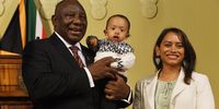 President Cyril Ramaphosa holds the son of  Alexandra Lilian Amelia Abrahams (Deputy Minister of Trade, Industry and Competition) during the swearing-in ceremony of the newly appointed members of the National Executive at Union Buildings on November 17, 2025 in Pretoria, South Africa. The ceremony follows President Cyril Ramaphosa’s recent announcement of changes to the executive, aimed at strengthening governance and addressing key sectoral needs.(Photo by Gallo Images/Frennie Shivambu).