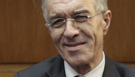 Greek banker once jailed by junta takes on new fight