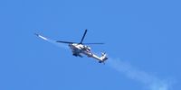 An Israeli Apache helicopter fires a missile over the Gaza Strip, as seen from Sderot, Israel, 03 November 2023. More than 9,000 Palestinians and at least 1,400 Israelis have been killed, according to the Israel Defense Forces (IDF) and the Palestinian health authority, since Hamas militants launched an attack against Israel from the Gaza Strip on 07 October, and the Israeli operations in Gaza and the West Bank which followed it. Israeli military spokesperson Daniel Hagari announced on 02 November that IDF troops 'completed the encirclement of Gaza City' as Israel continues 'ground, air and naval strikes' in the Gaza Strip.  (Photo: EPA-EFE/ATEF SAFADI)