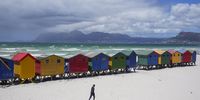 epaselect epa10374763 A man walks across Muizenberg beach in Cape Town, South Africa, 20 December 2022. With Cape Town in peak tourist season some pristine beaches have been closed due to sewage pollution. In the past week both Muizenberg and Fish Hoek beaches have been closed at stages by authorities concerned of potential gastrointestinal issues due to sewage. Organisation ActionSA Western Cape chairperson Michelle Wasserman said sewage infrastructure in the city had worsened over the past few years. The city of Cape Town is monitoring water contamination levels and opens and closes the beaches according to contamination levels.  EPA-EFE/NIC BOTHMA