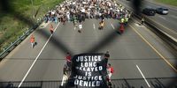 ST PAUL, MINNESOTA - MAY 31: Demonstrators march on I- 35 while participating in a protest against police brutality and the death of George Floyd, on May 31, 2020 in St. Paul, Minnesota. Protests continue to be held in cities throughout the country over the death of George Floyd, a black man who died while in police custody in Minneapolis on May 25. (Photo by Scott Olson/Getty Images)